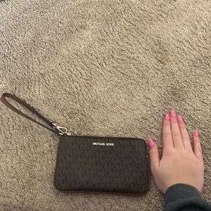 Brown gently used Michael Kors wristlet excellent condition